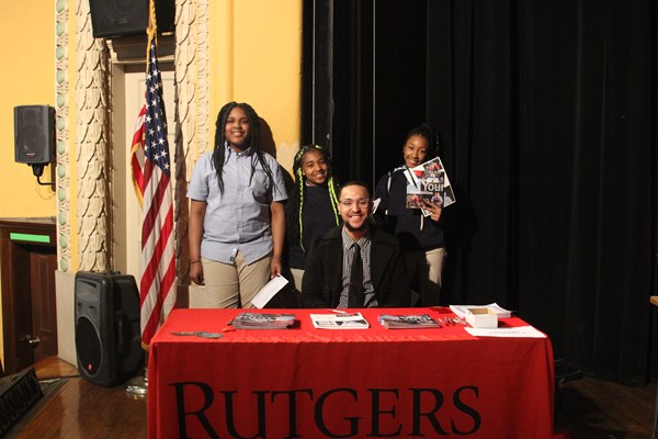 Mr. Tevin Reese, admission college at Rutgers University meets with DLEACS students to share college admission requirements,